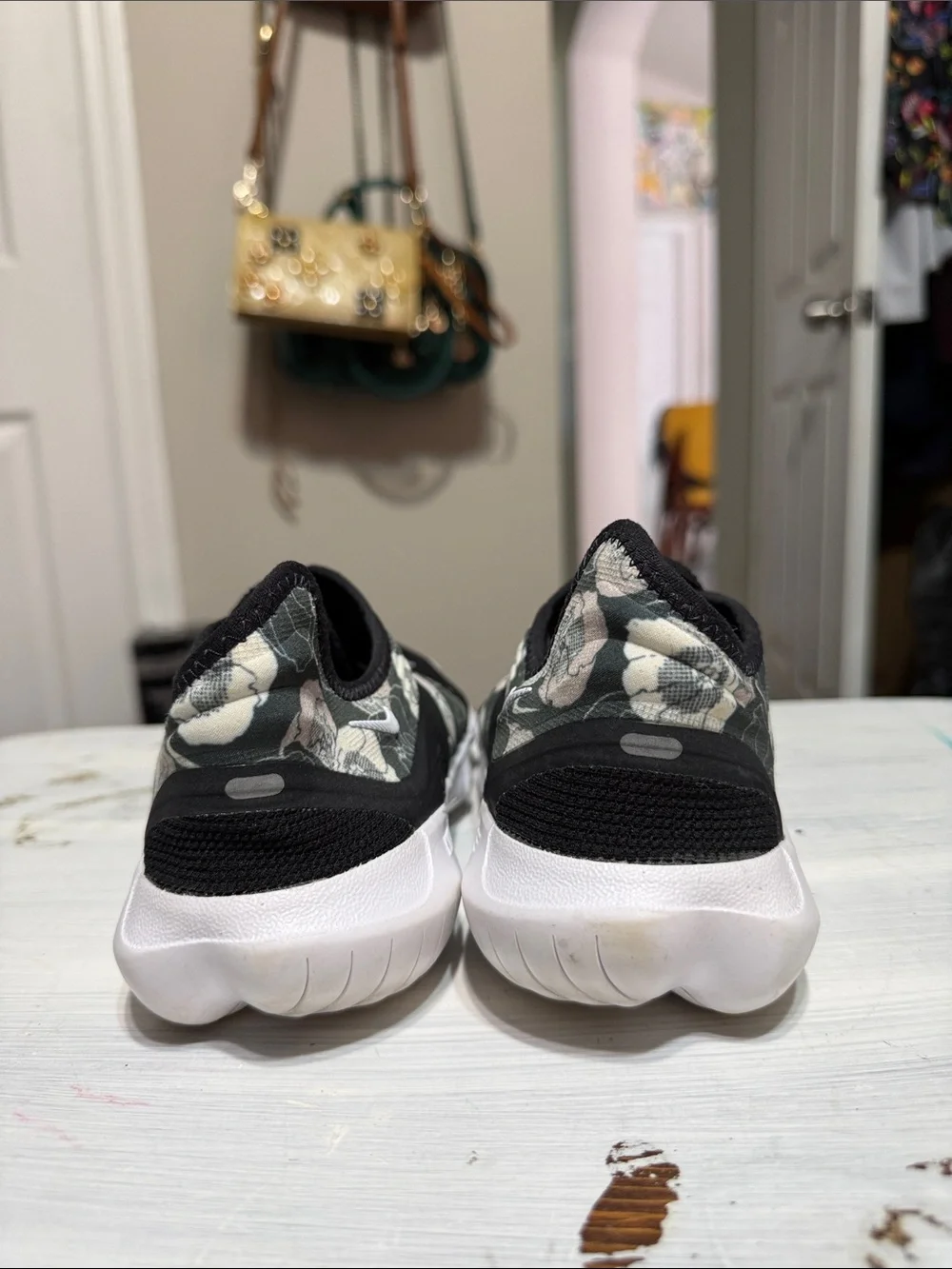 Nike Free RN Flyknit 3.0 sneakers in a black floral colorway size 8